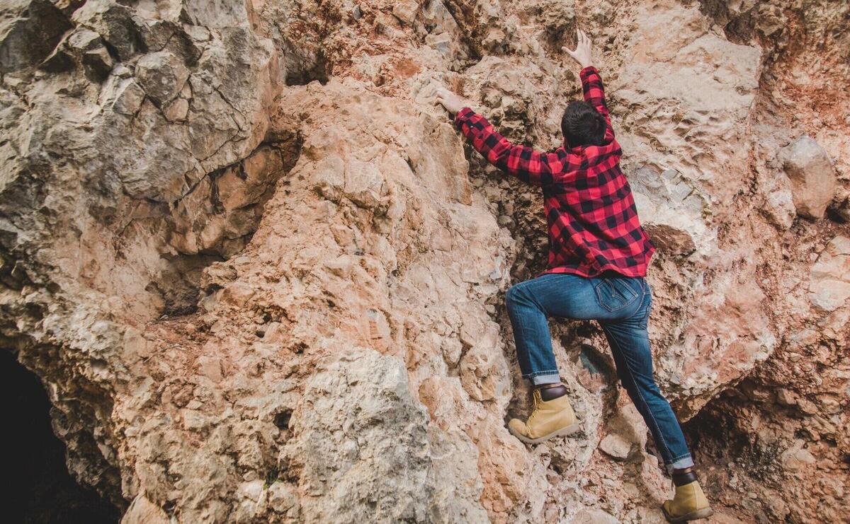 Young man climbing