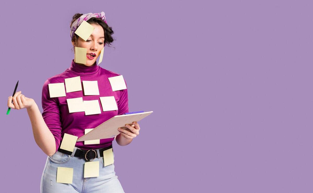 Woman with sticky notes on her and copy space