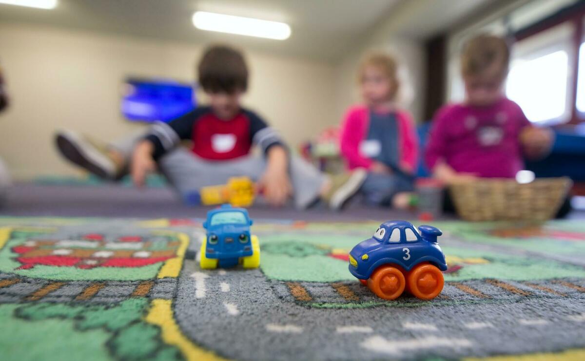 Kids play with car toys