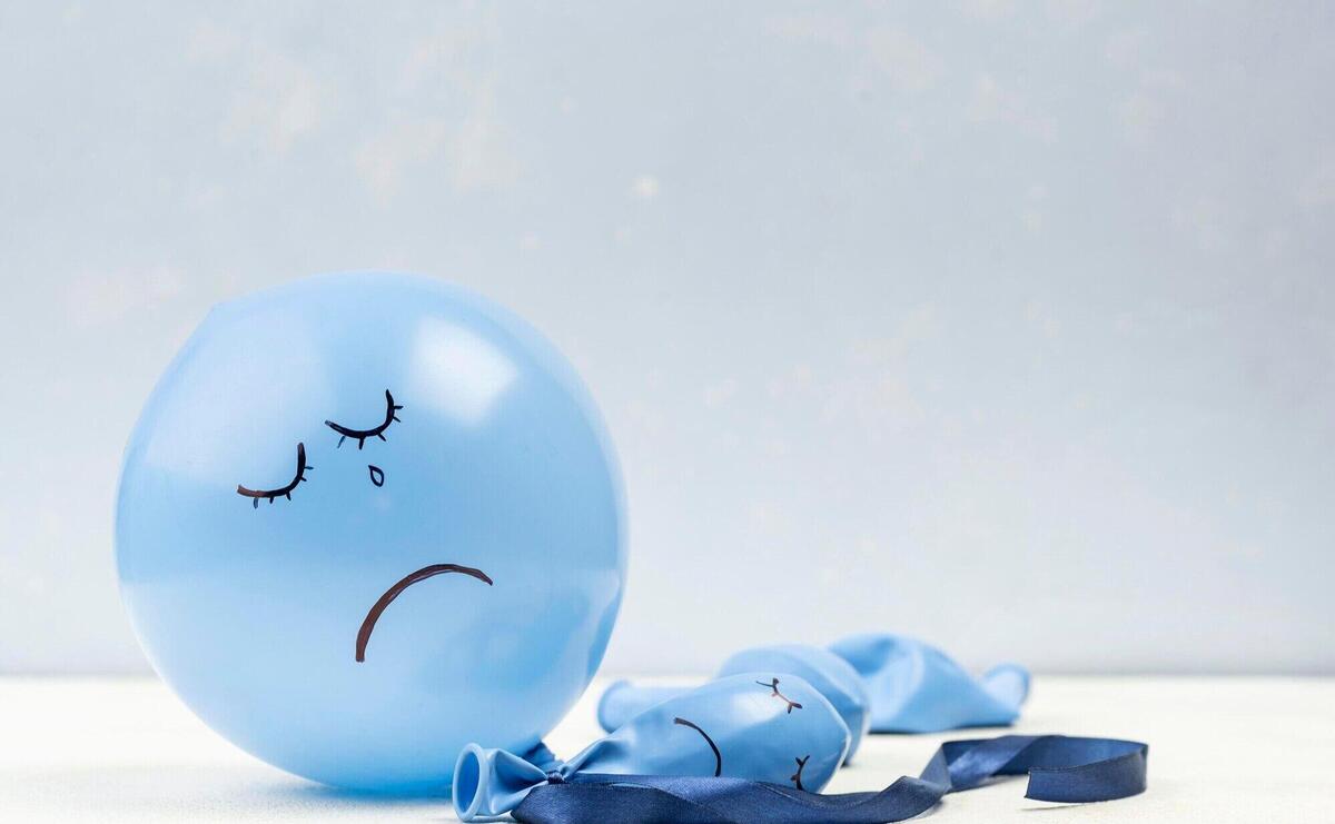 Sad balloon with copy space for blue monday