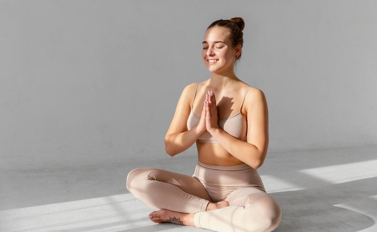 Full shot happy woman on floor