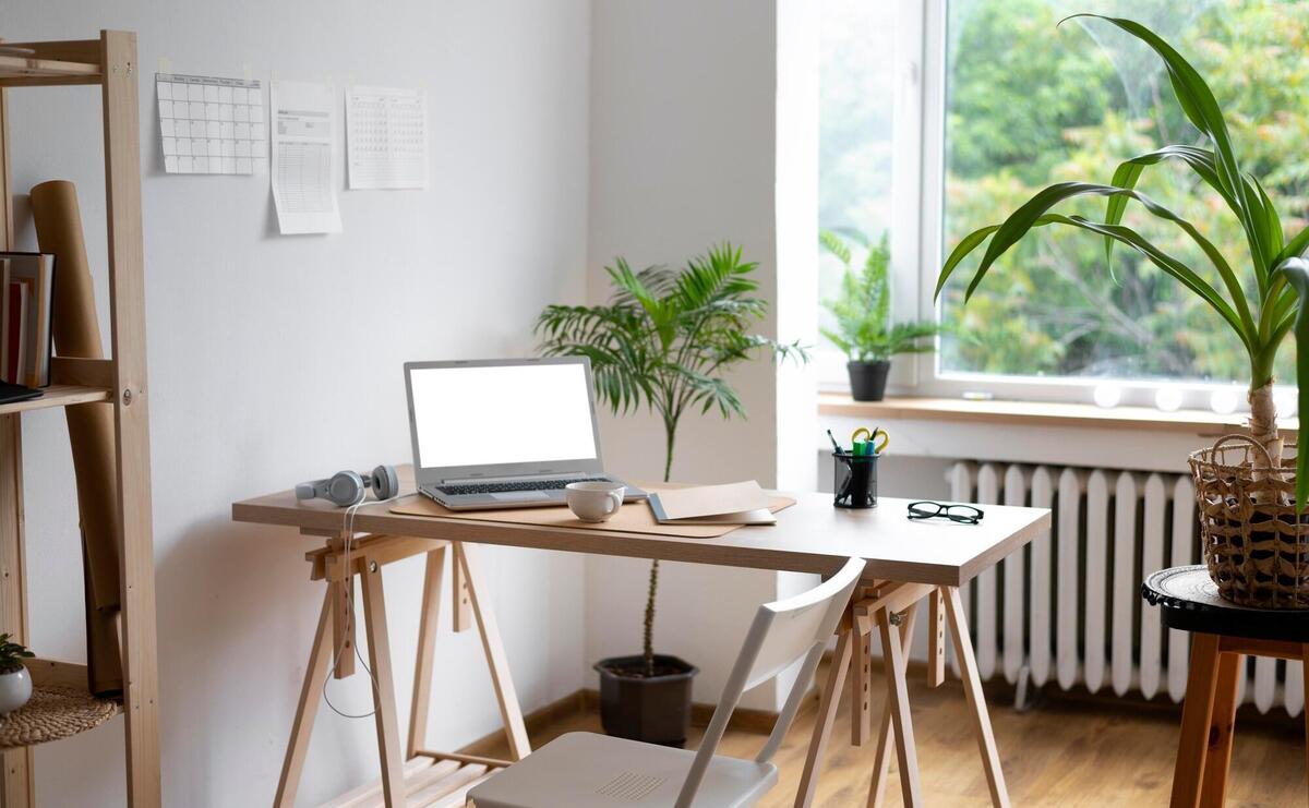 High angle desk arrangement with laptop