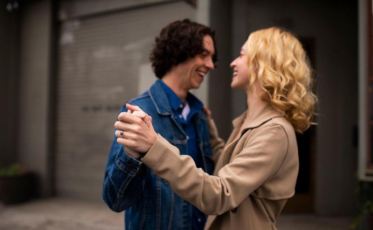 Romantic couple in the city with engagement ring after proposal