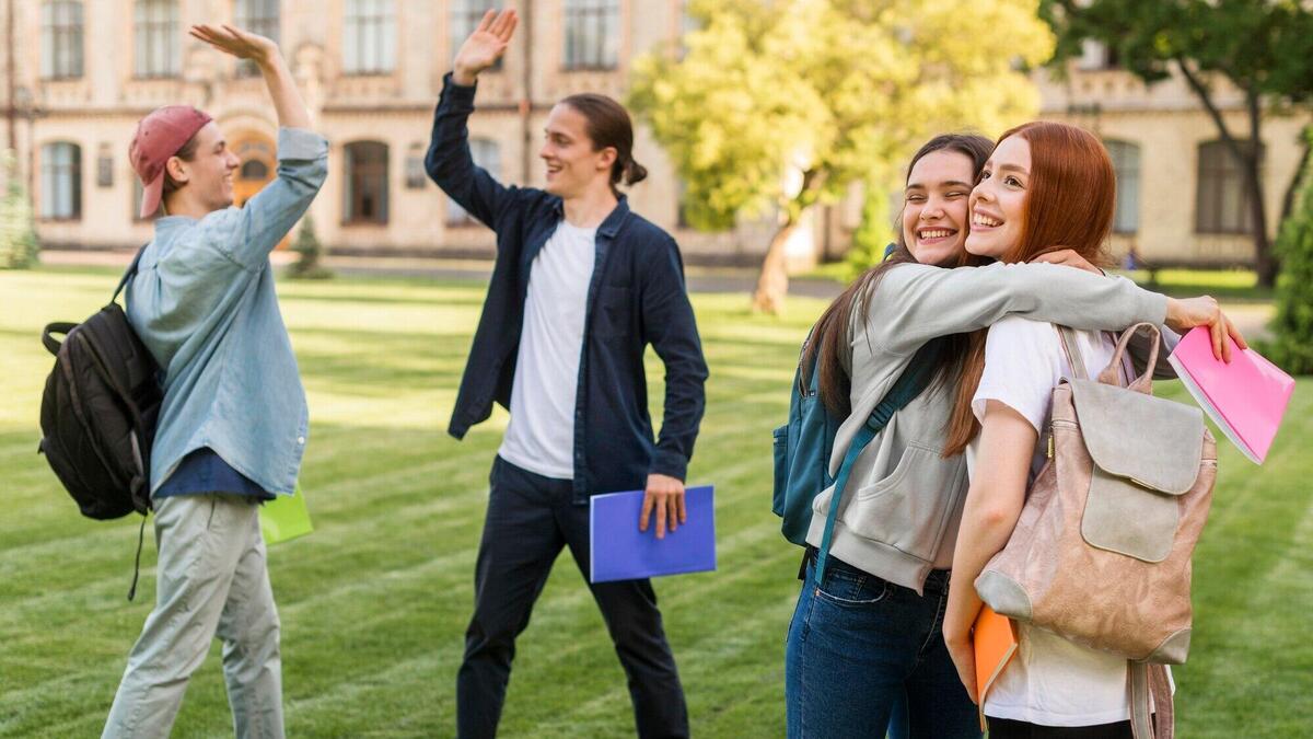 Group of friends happy to be back at university